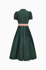 Grünes hochgeschlossenes Dirndl von Gottseidank. Rückenansicht. 
