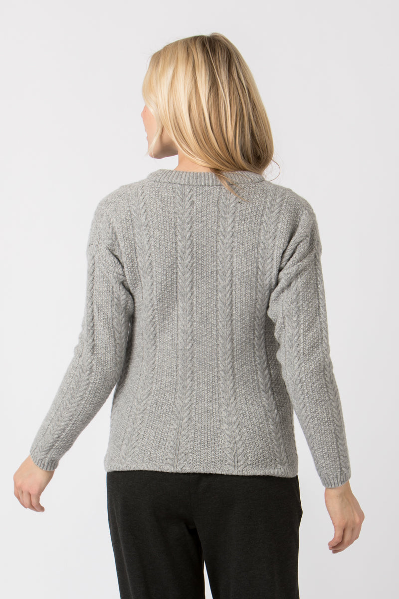 Almliebe Strickjanker Rote Wand