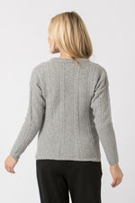 Almliebe Strickjanker Rote Wand