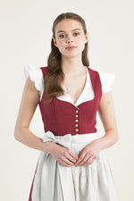 Heimatglück Leinendirndl Vivienne rot Detail Schürze creme | Heimatglück linen dirndl Vivienne red cream apron detail