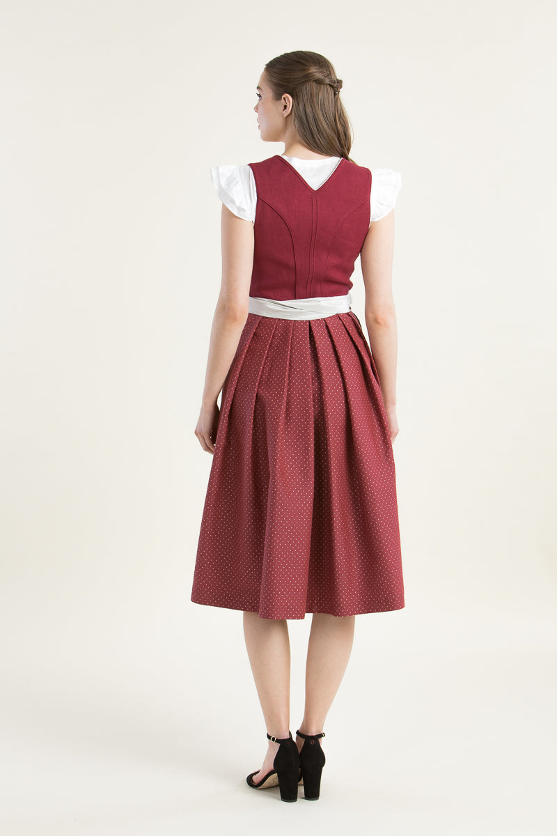 Heimatglück Leinendirndl Vivienne rot Detail Schürze ton-in-ton | Heimatglück linen dirndl Vivienne red tone-in-tone apron detail